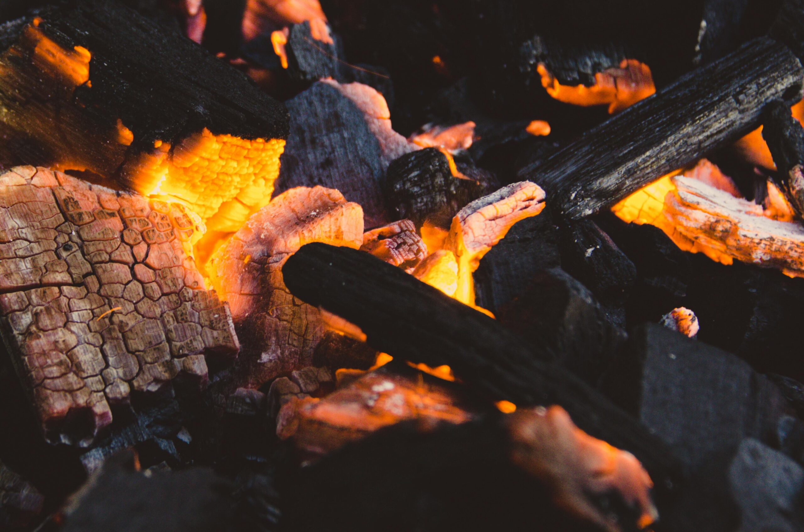 Burning logs inside a gas fireplace.